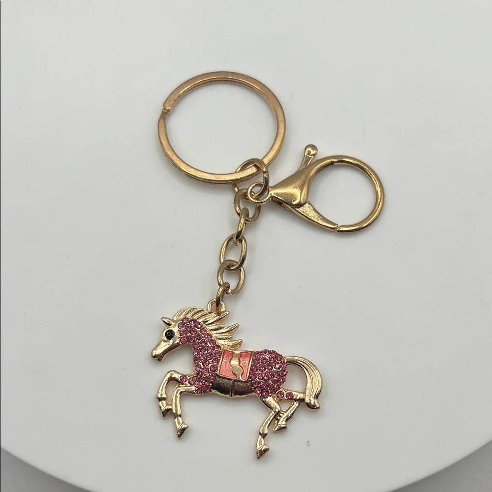 658. Gold and Pink Horse Keychain